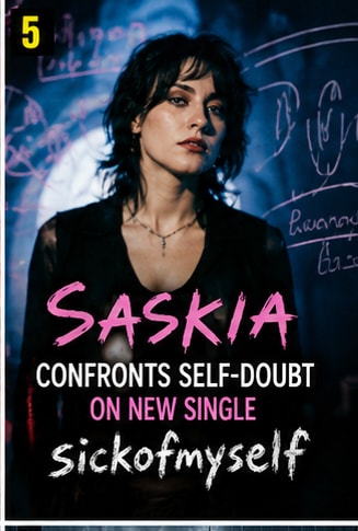 Atmospheric portrait of alt-pop songwriter Saskia in soft blue light.