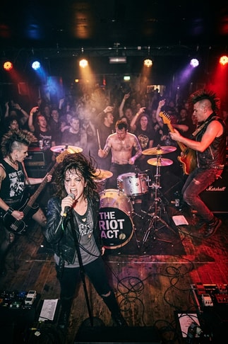 Shadowy live punk concert venue performance photography for Ceremony album Tell Me Your Dream.