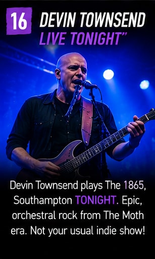 Devin Townsend playing guitar with expressive intensity under theatrical blue lights.