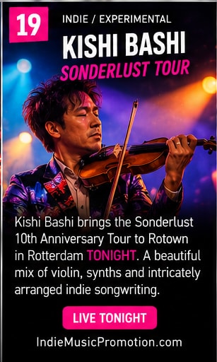 Kishi Bashi performing with violin.