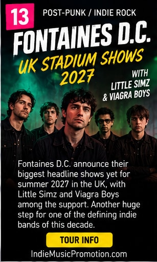 Fontaines D.C. performing live on stage surrounded by theatrical lighting.
