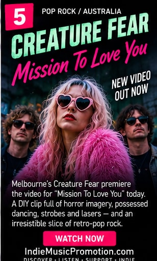 Creature Fear singer wearing pink heart sunglasses and feather boa.