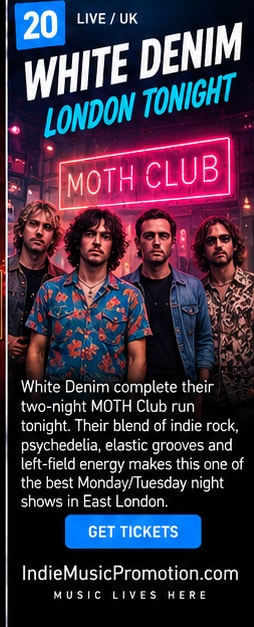 White Denim band members standing under pink neon MOTH Club sign.