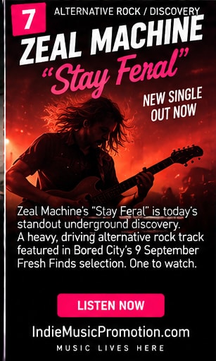 Guitarist in red stage wash playing passionately for Zeal Machine Stay Feral.