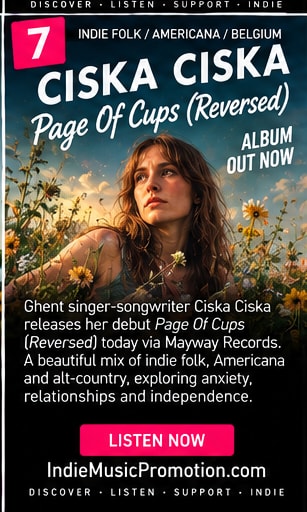 Ciska Ciska surrounded by wildflowers in a warm portrait for Page Of Cups Reversed.