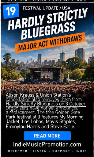 Hardly Strictly Bluegrass stage and San Francisco skyline beneath a blue sky.