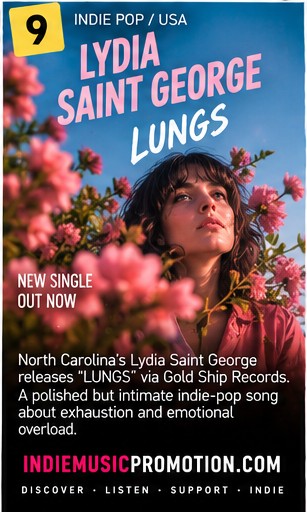 Lydia Saint George looking upward amidst pink floral blooms for her single LUNGS.